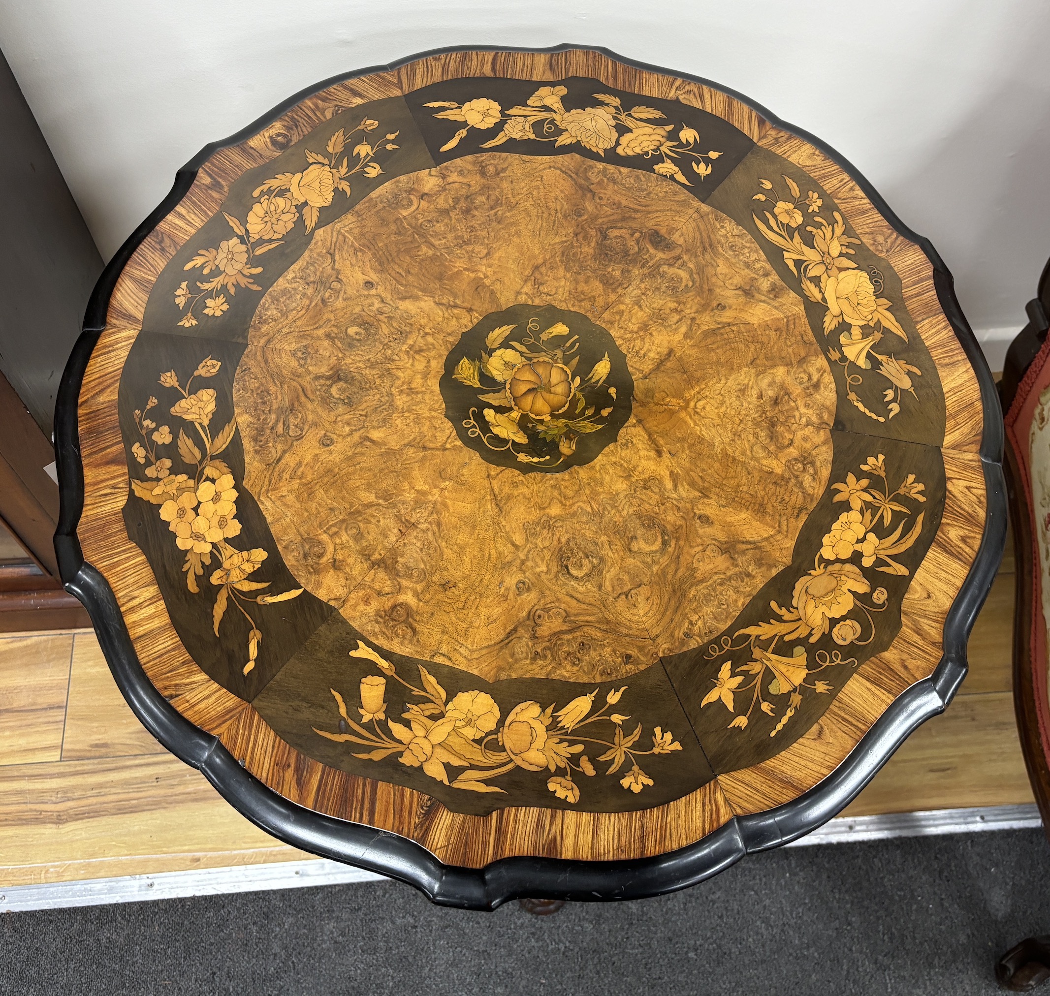 A 19th century Italian floral marquetry burr walnut circular tripod table, diameter 70cm, height 75cm